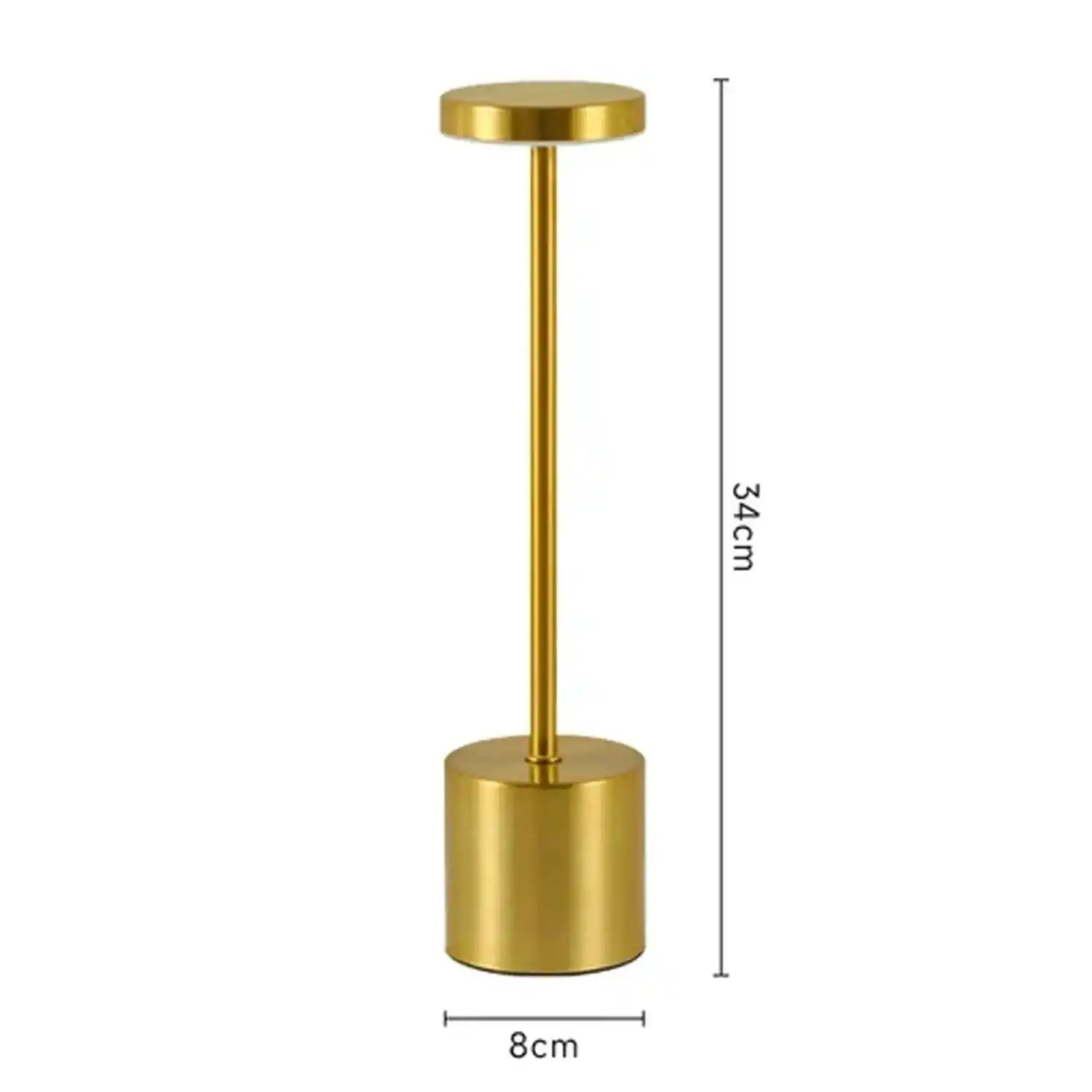 Złota lampa biurkowa o nowoczesnym designie wysokość 34 cm i średnica podstawy 8 cm
