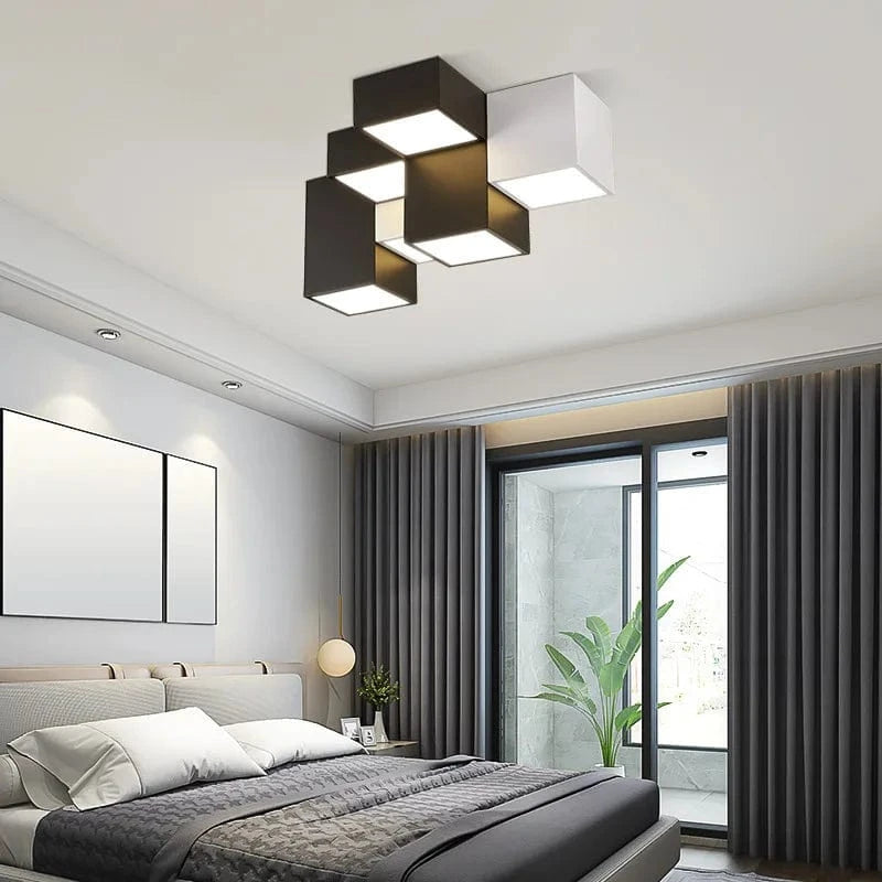Nowoczesny plafon LED Mavesan w geometrycznym designie zamontowany na suficie w sypialni