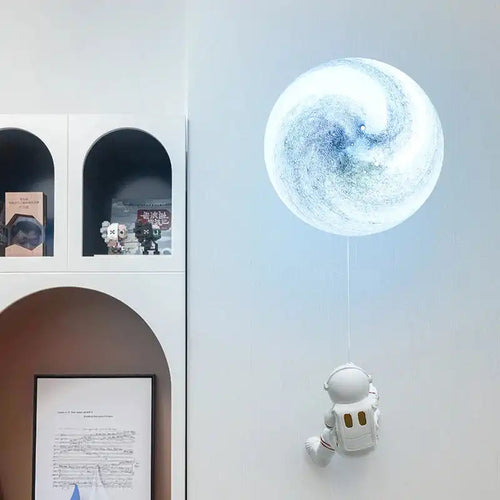 Oświetlenie LED Astrae MARUISAN z kosmonautą jako dekoracyjne światło ścienne