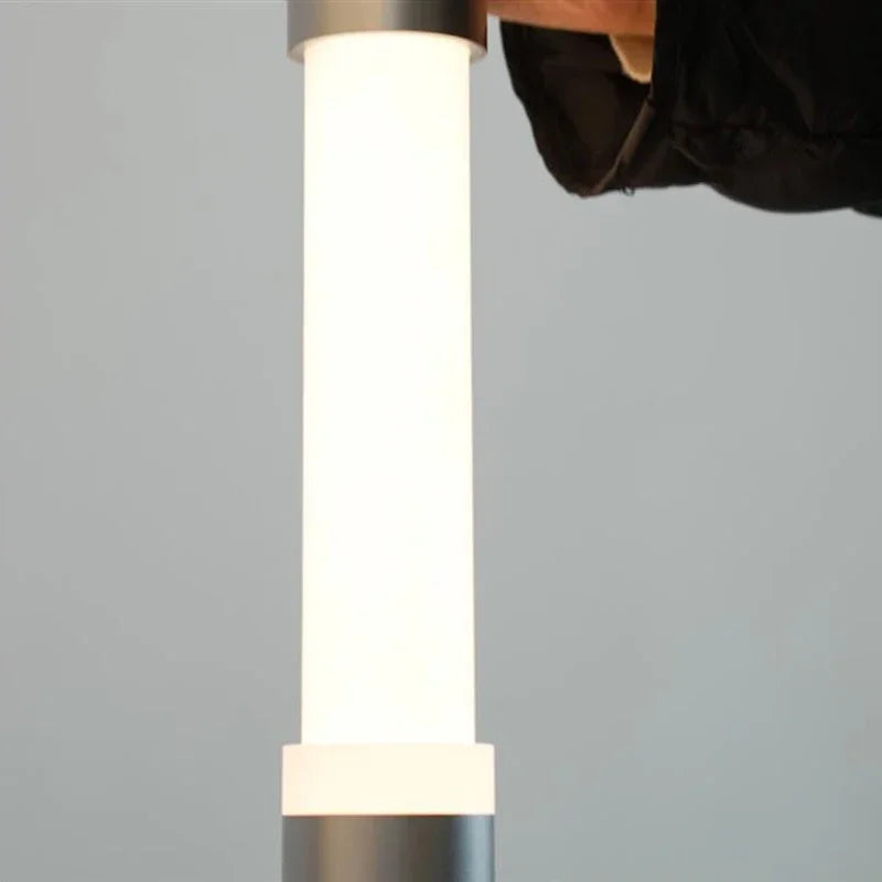 CHUBAN designerska lampa podłogowa z nowoczesnym białym kloszem i metalową podstawą