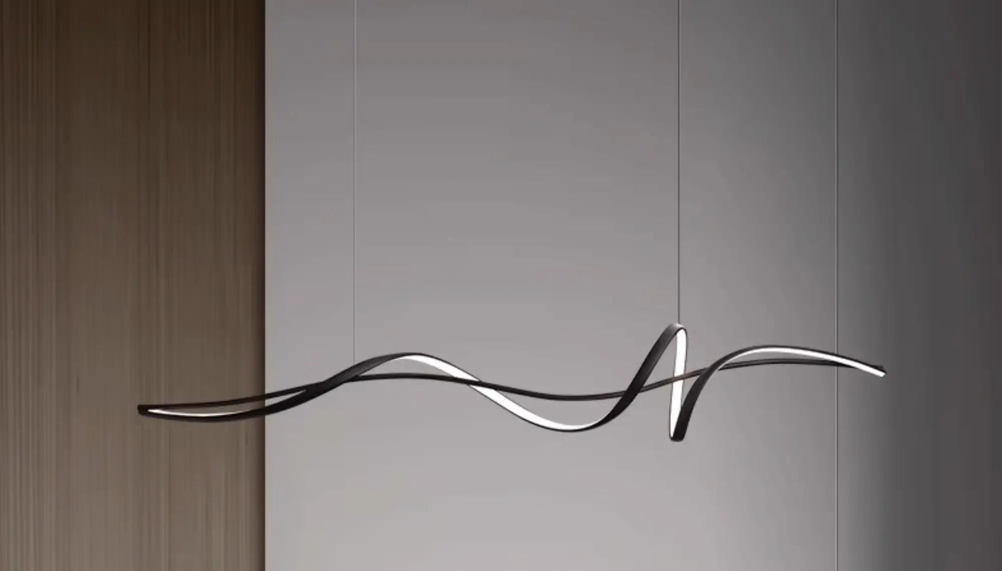 Nowoczesne designerskie oświetlenie do jadalni w formie falującej czarnej lampy wiszącej