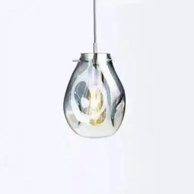 Nowoczesna lampa wisząca ze szklanym kloszem i metalowym mocowaniem ekskluzywne oświetlenie wnętrz