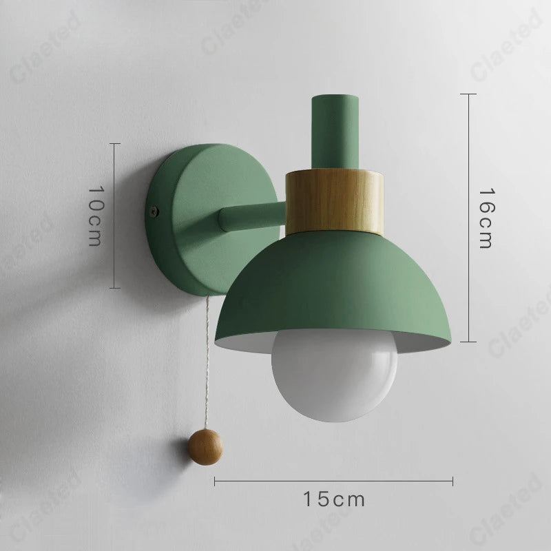 Lampa ścienna Claeted w kolorze zielonym, styl nowoczesny, przeznaczona do salonu, średnica 15 cm