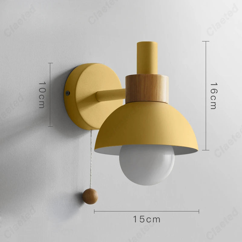 Kolorowa lampa Claeted, ścienna, żółta, przód, do salonu