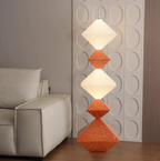 Nowoczesna podłogowa lampa Inna marka z kreatywne lampy geometryczne w białym i pomarańczowym kolorze