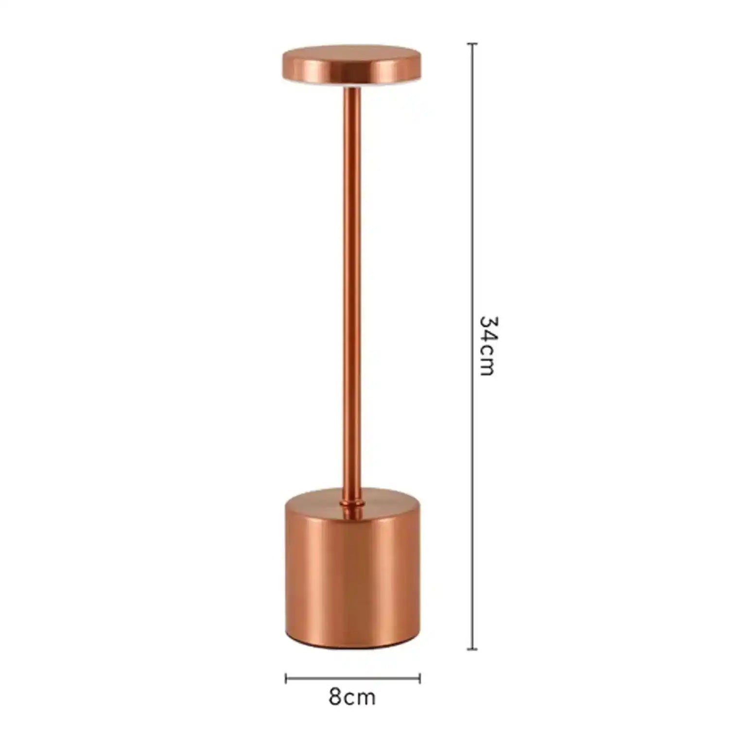 Nowoczesna miedziana lampa biurkowa o wysokości 34 cm i średnicy podstawy 8 cm