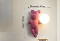 Różowa lampa miś ścienna o wymiarach 30 cm średnicy i 20 cm wysokości, idealna do pokoju dziecięcego