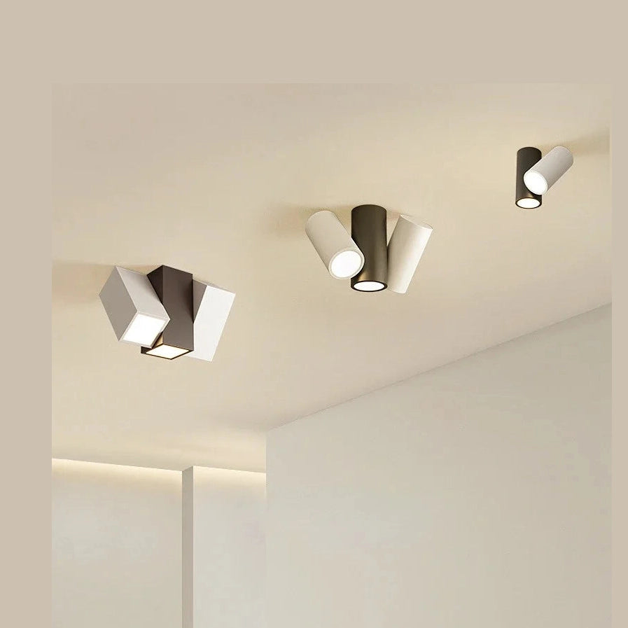 Lampa sufitowa, nowoczesny design, biała i czarna, zainstalowana na suficie w stylowym wnętrzu