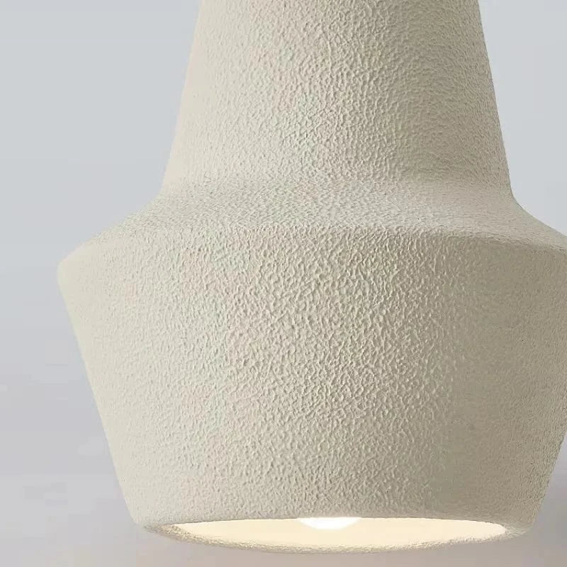 Beżowa teksturowana lampa wisząca DRMIYA o nowoczesnym kształcie i subtelnym świetle