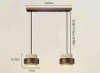 Designerska lampa wisząca z dwoma okrągłymi kloszami i regulowaną wysokością kabli