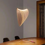 Nowoczesna lampa wisząca JIANKEXING z unikalnym designerskim abażurem nad stołem