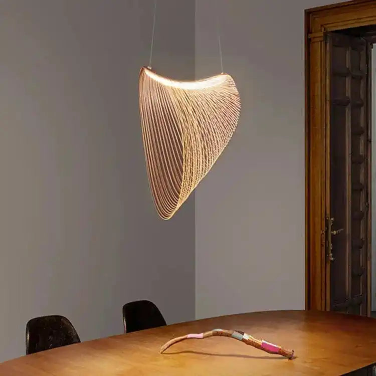 Nowoczesna lampa wisząca JIANKEXING z unikalnym designerskim abażurem nad stołem