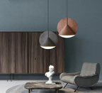 Nowoczesny salon z lampą wiszącą nowoczesną Blonche w kolorach szarym i miedzianym