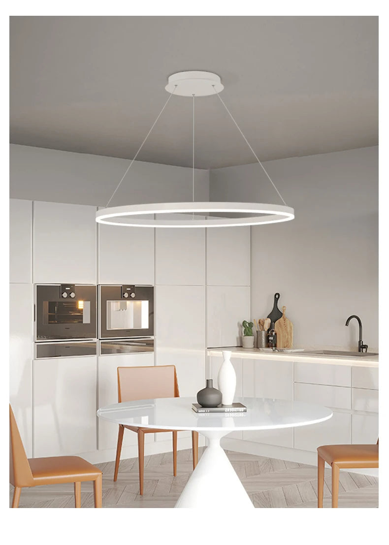 Lampa wisząca DAMIASMIL nowoczesna okrągła LED na kablach w białej kuchni nad stołem