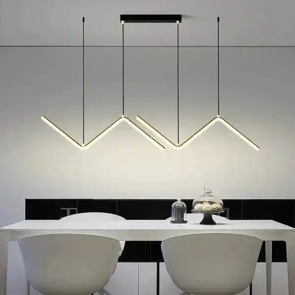 Nowoczesne lampy designerskie do wnętrz w formie geometrycznego żyrandola nad białym stołem