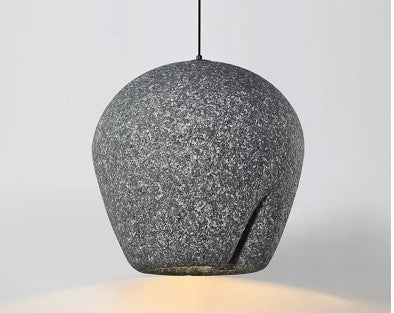 Szara nowoczesna lampa wisząca DRMIYA o unikalnym owalnym kształcie i teksturowanej powierzchni