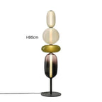 Nowoczesna lampa podłogowa z czterema kolorowymi kloszami o wysokości 80 cm