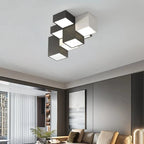 Nowoczesny plafon LED od Mavesan w geometrycznym kształcie na suficie w salonie